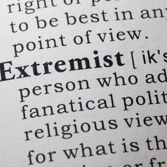 Dictionary page with partially visible
                      definition of EXTREMIST