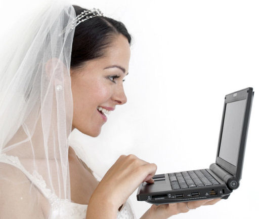 Bride interacting with a laptop screen