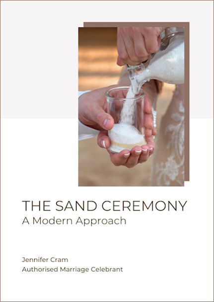 Cover of The Sand
                    Ceremony: A Modern Approach, by Jennifer Cram,
                    Authorised Marriage Celebrant. Photograph of a
                    couple, dressed in white, pouring white sand into a
                    container. Only their hands and lower arms are
                    visible.